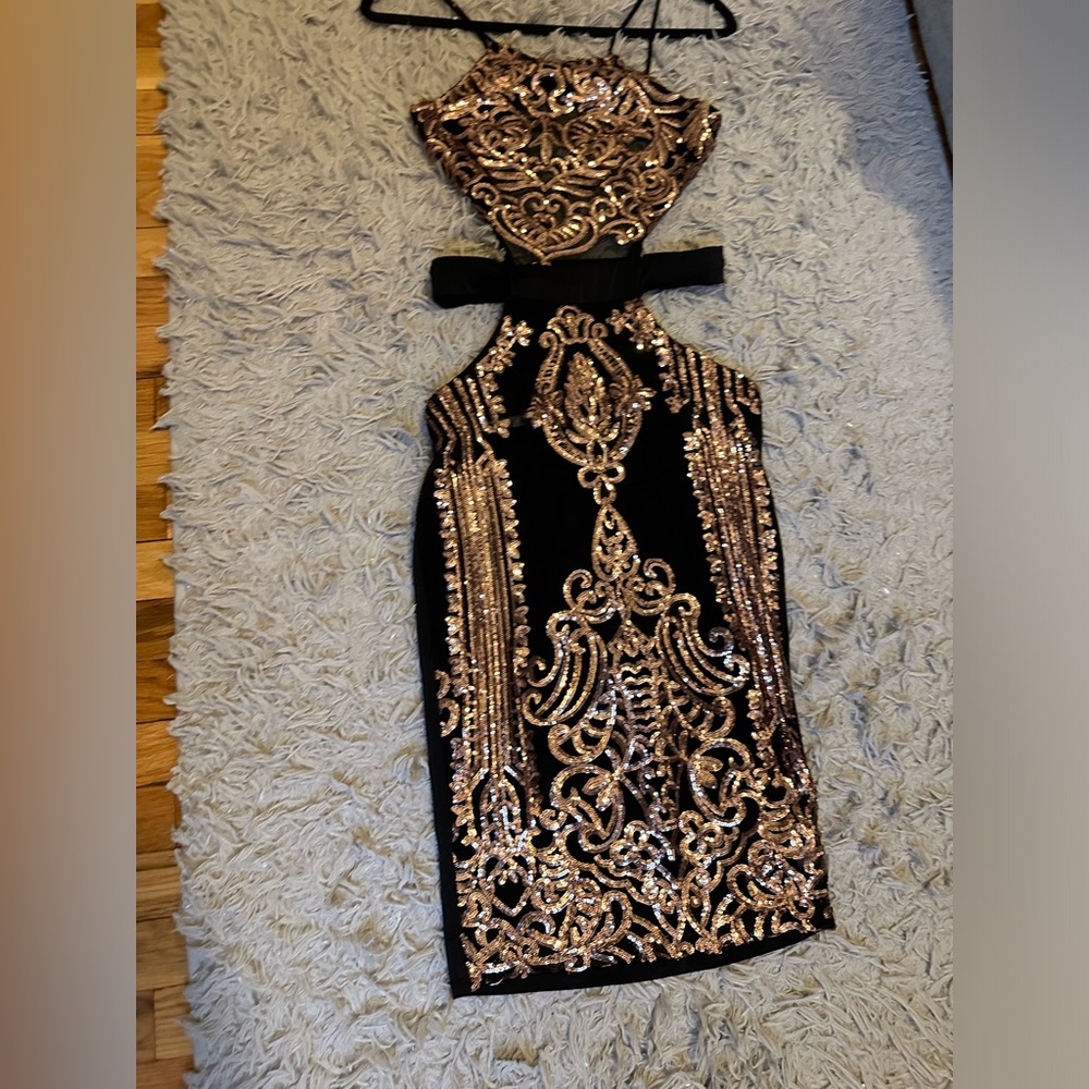 Black and gold open back dress